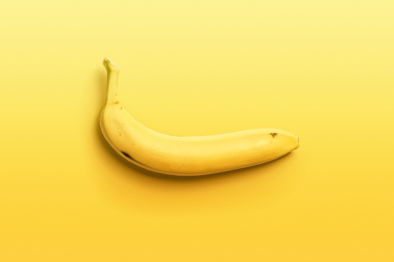 Banana on yellow background