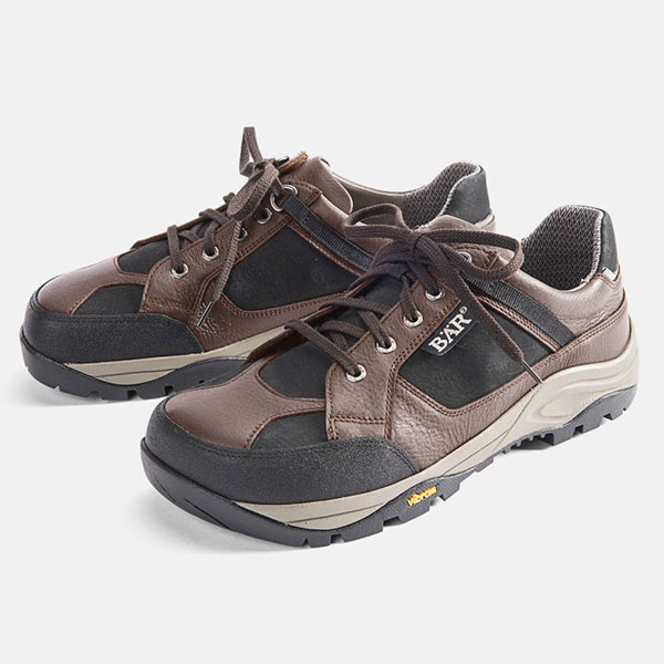 Pair of men's brown leather hiking shoes with sturdy soles