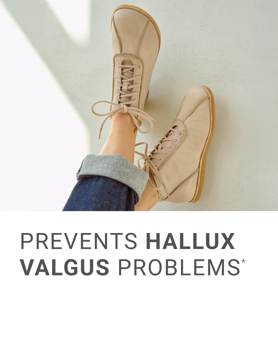 Person wearing beige shoes that help prevent hallux valgus issues.