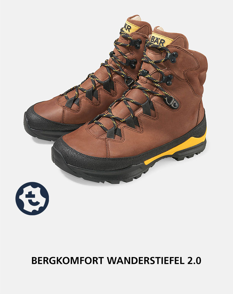 Pair of brown leather hiking boots with yellow accents, designed for mountain comfort and durability.