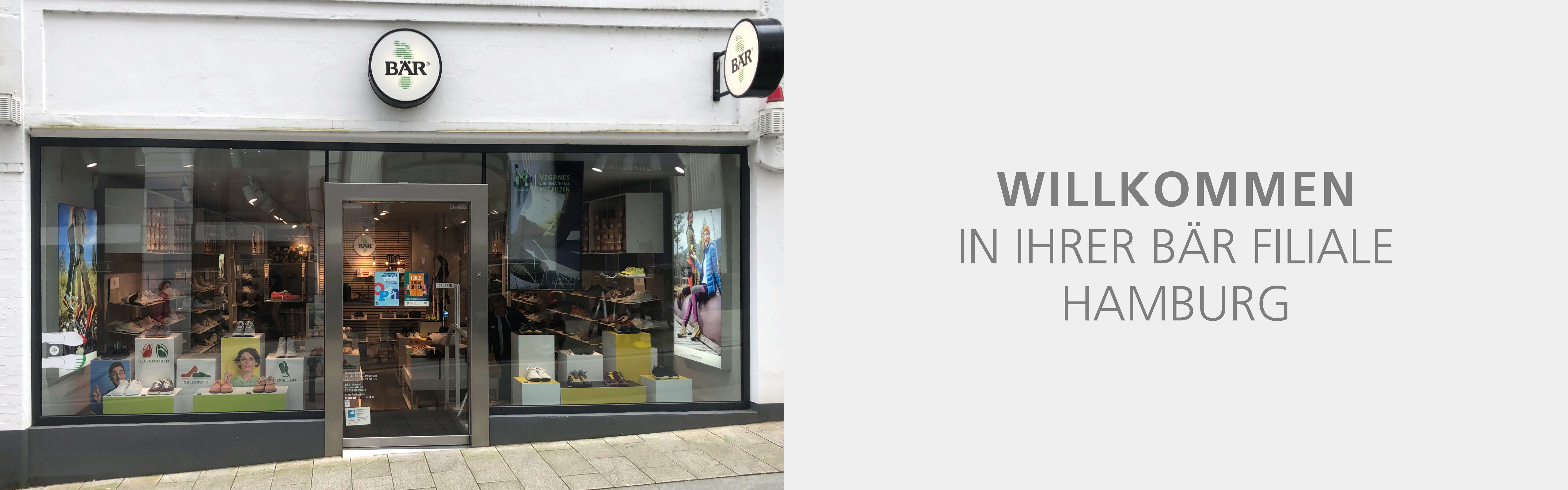 The BÄR store in Hamburg displaying shoes in the window and a welcome sign
