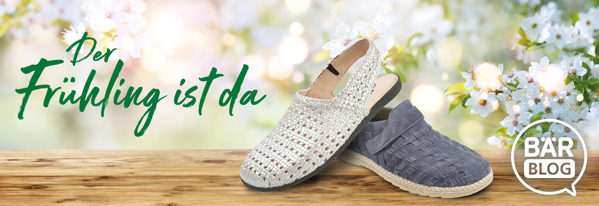 Woven spring shoes on a wooden surface with blooming flowers and text 'Spring is Here' in the background, promoting BÄR Blog.