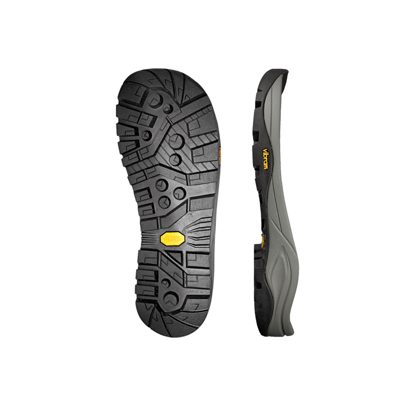 Black Vibram rubber sole showcasing detailed tread pattern and side view
