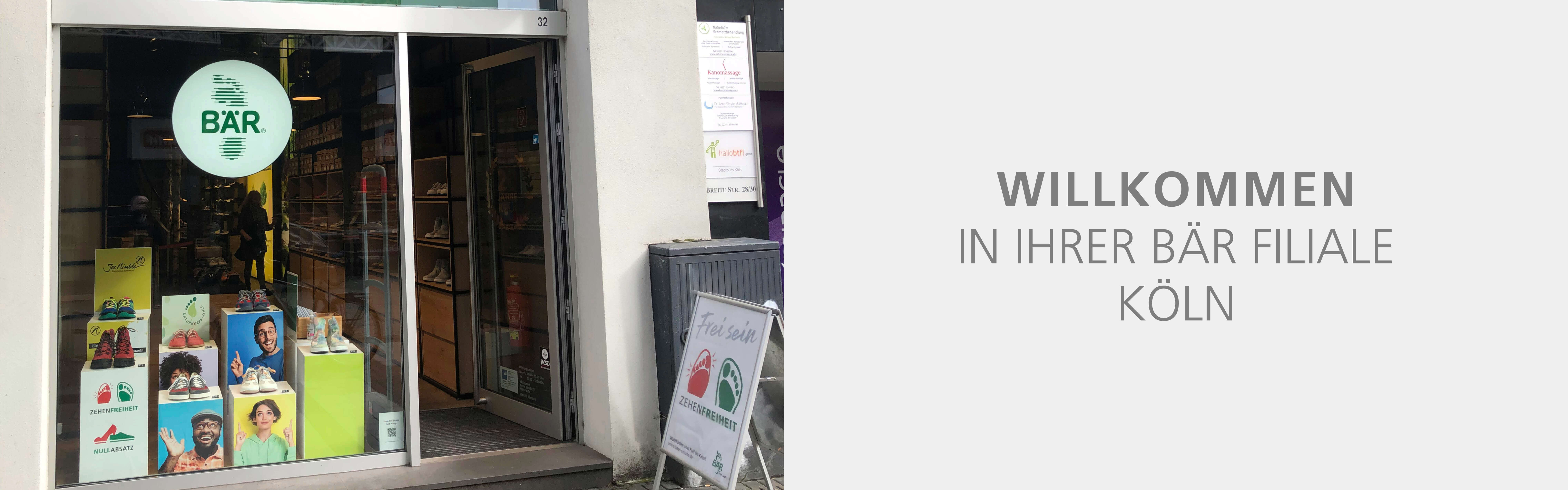 Entrance of BÄR shoe store in Cologne with colorful shoe displays